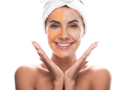 A girl with a scab on her face is smiling